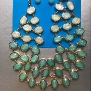 Beautiful aqua colored necklace with earrings!